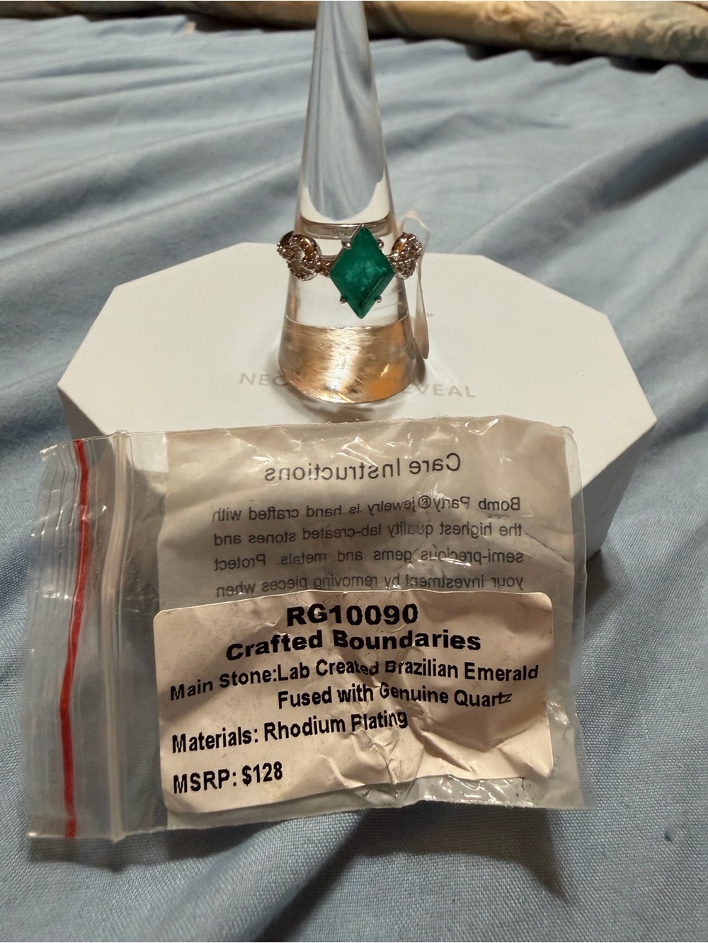 Crafted Boundaries: Brazilian Emerald Rhodium-Plated Ring